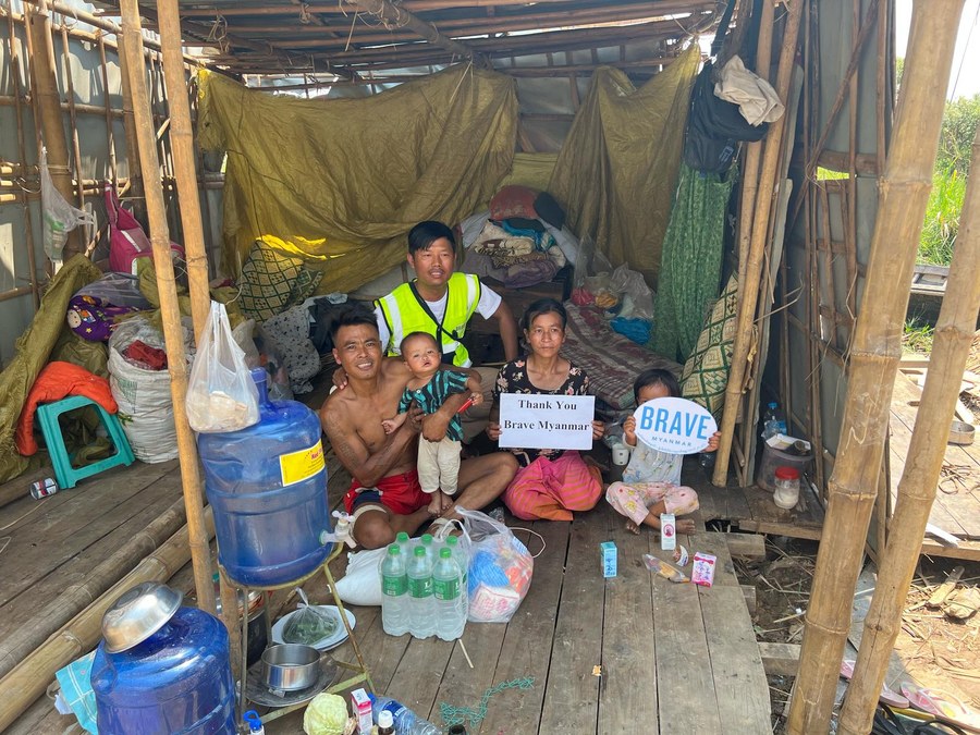 A community gathered for food distribution